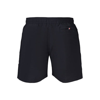Swim Shorts by Tommy Hilfiger for men in polyester and blue showcases a sinuous silhouette, expertly cut for a sinuous fit as part of the Men's Polyester Swim Shorts collection.