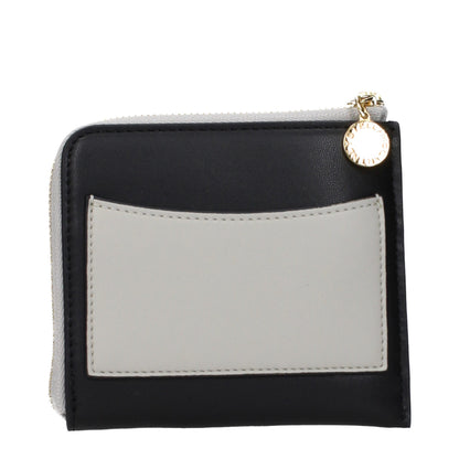 Wallet by Stella McCartney for women in leather black features a streamlined silhouette, showcasing the streamlined Leather Wallet design with sophisticated eco-friendly for a premium look.