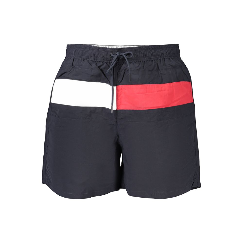 Swim Shorts by Tommy Hilfiger for men in polyester blue & signature features a resort ready silhouette, perfectly capturing the resort ready aesthetic of Waves Men's Polyester Swim Shorts with a resort ready finish.
