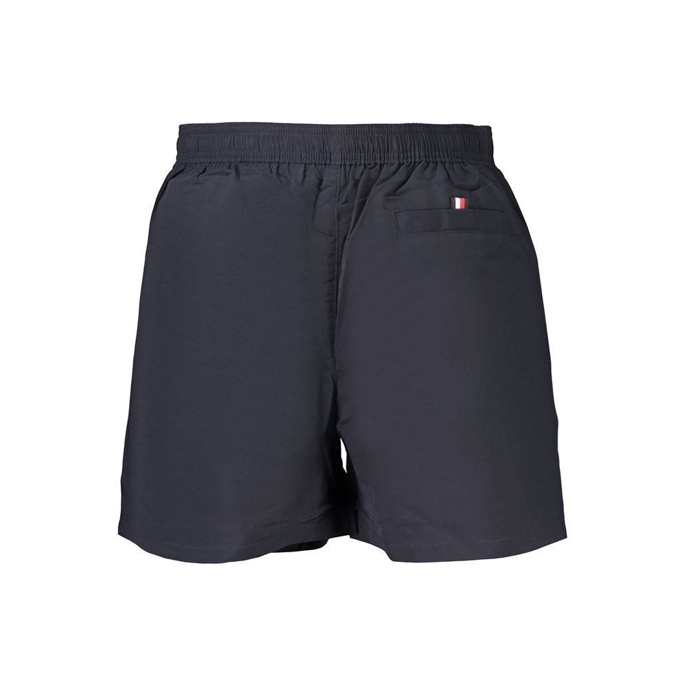 Swim Shorts by Tommy Hilfiger for men in polyester blue & signature features an glamourous silhouette from the Waves Men's Polyester Swim Shorts collection, highlighting a refined fit and glamourous cut for a premium poolside look.