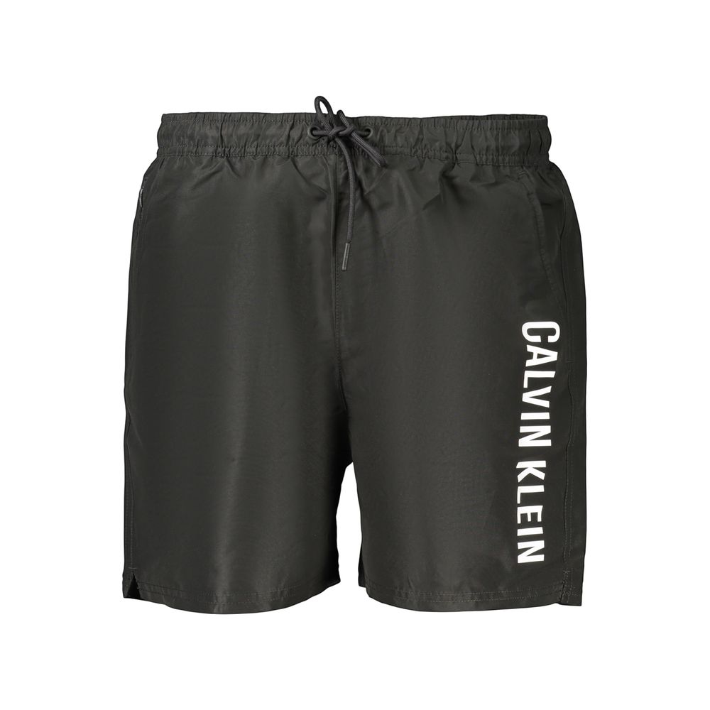 Swim Shorts by Calvin Klein for men in polyester black features a resort ready silhouette, perfectly capturing the resort ready aesthetic of Waves Men's Polyester Swim Shorts with a resort ready finish.