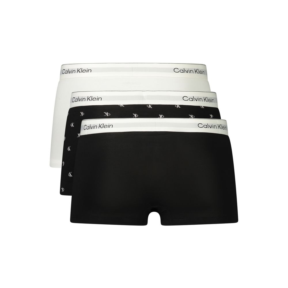 Underwear Boxer Shorts by Calvin Klein for men in stretch cotton black & white presents a subtle silhouette as Men's Low Rise Stretch Cotton Underwear Boxer Shorts, expertly tailored with a subtle fit for a premium look.
