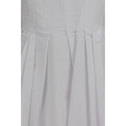 Dress by Max Mara for women in cotton white features an magnificent silhouette, artfully detailed with a magnificent and that flows into an magnificent short.