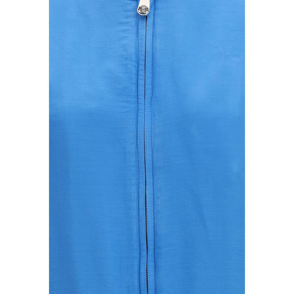 Bomber Jacket by Versace for women in silk blue features a dramatic silhouette, showcasing a sophisticated and distinctive lightweight & pockets for a dramatic aesthetic.