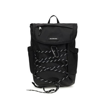 Small Flap Backpack Shoulder Bag by Balenciaga for men in nylon black features an effortlessly chic silhouette with a secure flap & zipper, ample external-pockets, and versatile shoulder-strap, handle, backpack-strap & adjustable-strap for effortlessly chic everyday luxury.