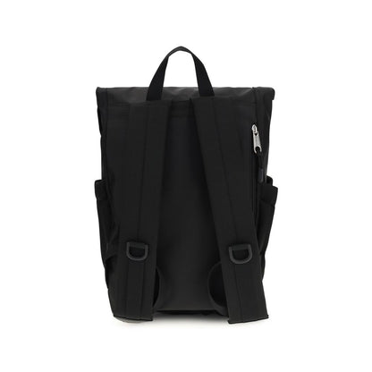 Small Flap Backpack Shoulder Bag by Balenciaga for men in nylon black features a effortless chic silhouette with a secure flap & zipper, ample external-pockets, and versatile shoulder-strap, handle, backpack-strap & adjustable-strap for a effortless chic finish.