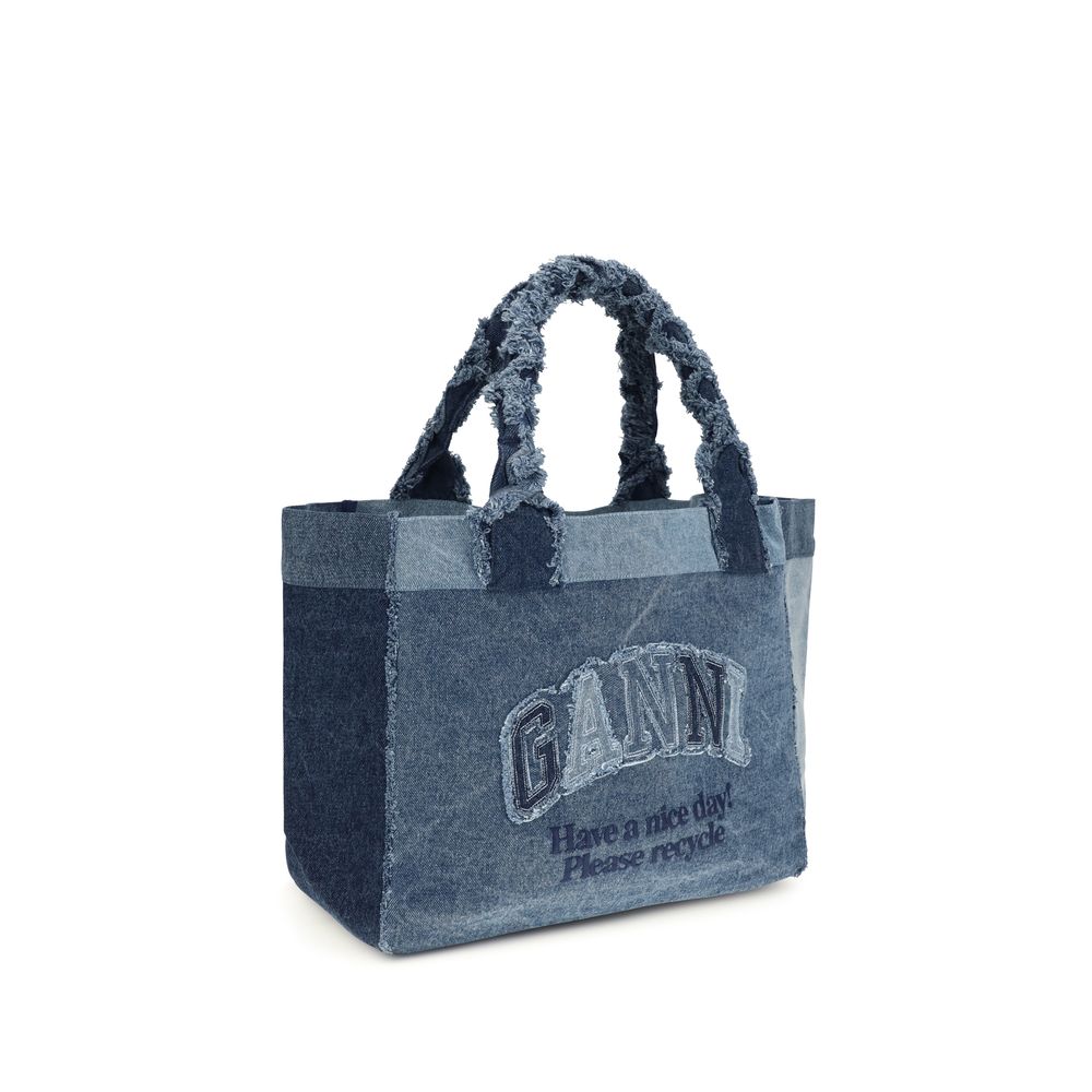 Medium Shopper Trapeze Handbag by Ganni for women in denim cotton blue features a refined silhouette, showcasing a secure , organized , and versatile for a refined finish.