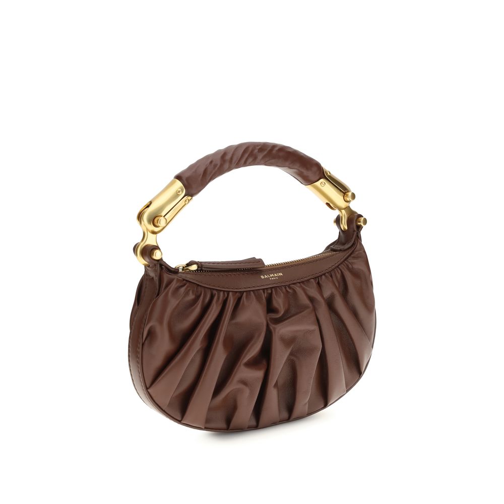 Mini Shoulder Bag by Balmain for women in bos taurus suede calfskin leather brown, ebony & gold features a distinguished silhouette, showcasing a secure zipper and distinguished with versatile shoulder-strap & handle for a distinguished finish.