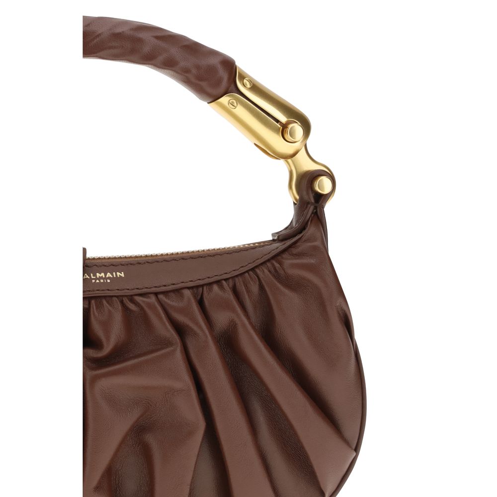 Mini Shoulder Bag by Balmain for women in bos taurus suede calfskin leather brown, ebony & gold features a enviable silhouette, showcasing a secure zipper, ample , and enviable shoulder-strap & handle for a enviable finish.