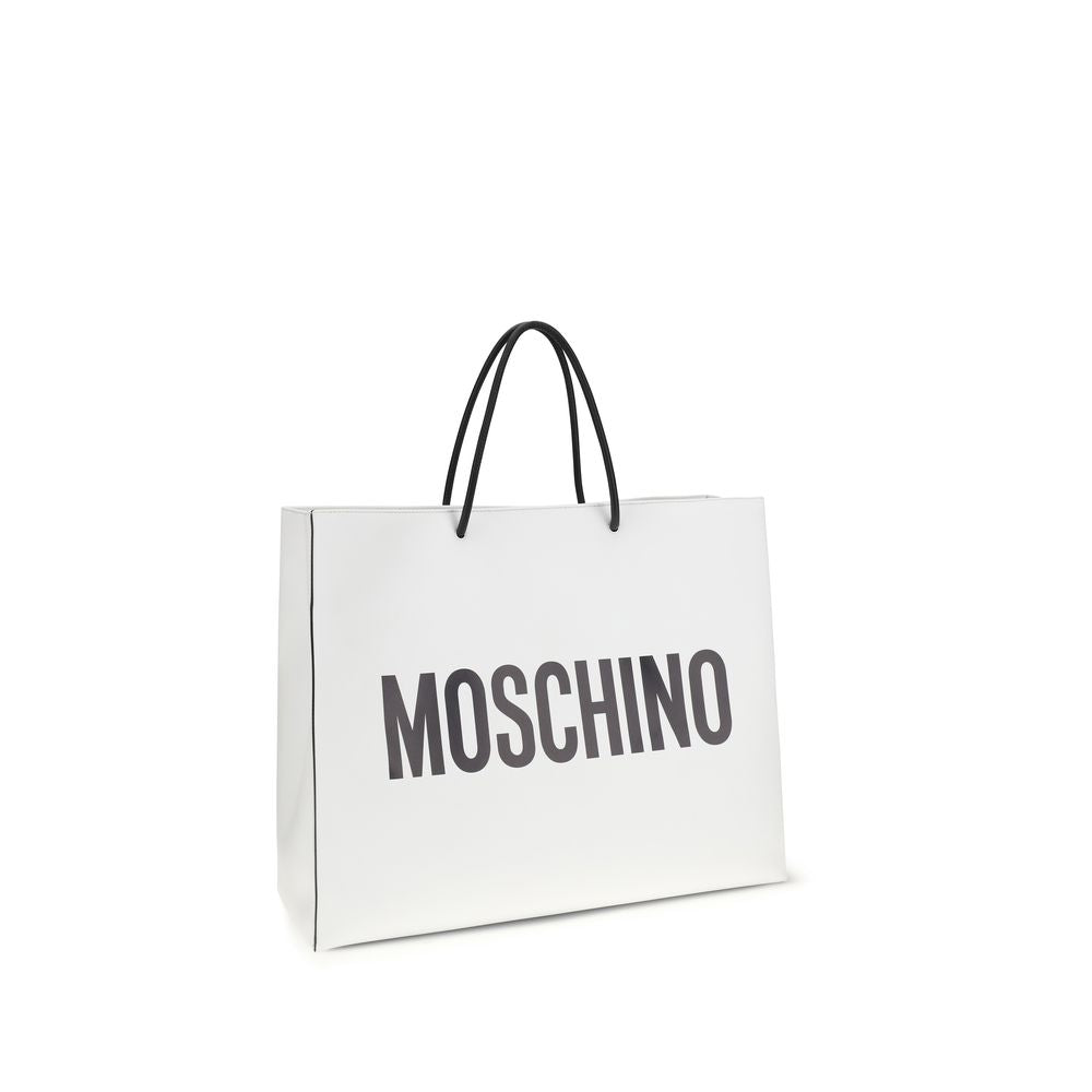 Travel Shoulder Shopper Handbag by Moschino for women in bos taurus calf leather white & print features a signature silhouette, showcasing a secure snap and signature with versatile shoulder-strap & handle for a sophisticated look.