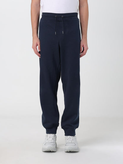 Joggers by Armani Exchange for men in cotton blue features a polished silhouette with a polished relaxed-fit, reaching a polished long and finished with a polished .