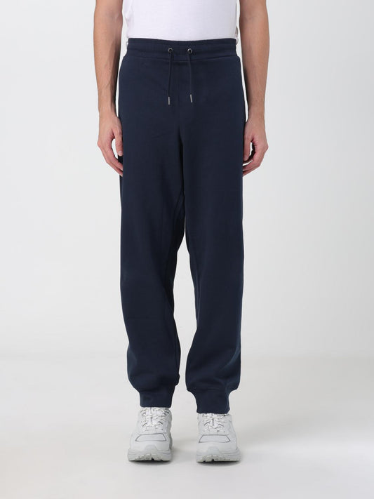 Joggers by Armani Exchange for men in cotton blue features a polished silhouette with a polished relaxed-fit, reaching a polished long and finished with a polished .