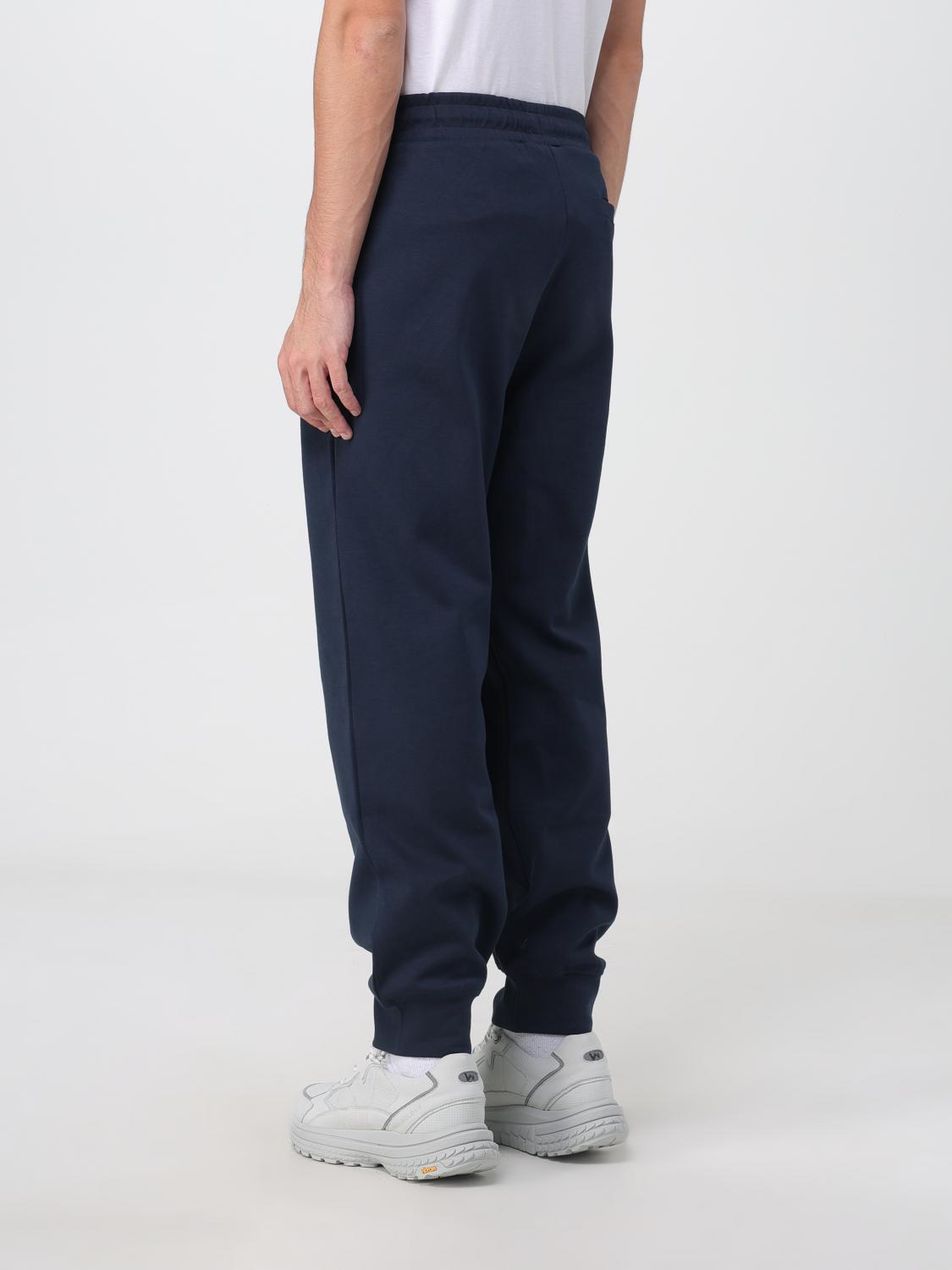 Joggers by Armani Exchange for men in cotton blue features an refined tailoring silhouette, showcasing a premium relaxed-fit with a and long cut for a refined tailoring look.