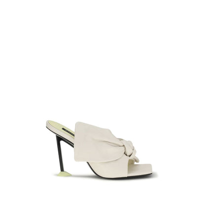 Mules Flat Shoes by Givenchy for women in nappa leather white showcases a resplendent Women's Nappa Leather Mules Flat Shoes aesthetic with a and .
