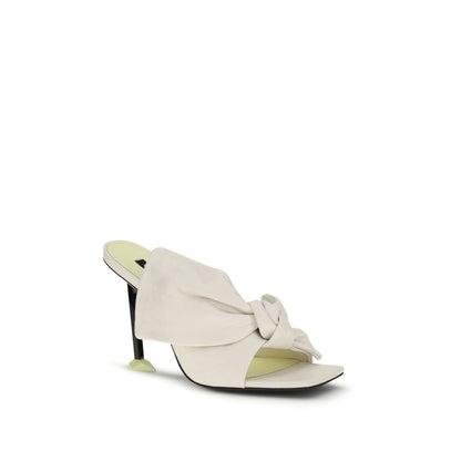 Mules Flat Shoes by Givenchy for women in nappa leather white features an captivating silhouette, showcasing the captivating style of the Women's Nappa Leather Mules Flat Shoes with its distinct and refined .