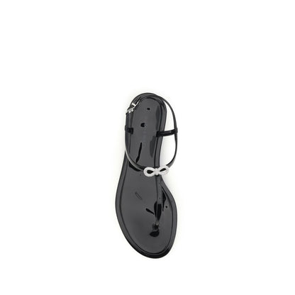 Flat Ankle Strap Thong Sandals by MACH & MACH for women in crystal & rubber black & signature showcases a sculptural silhouette as Women's Crystal & Rubber Flat Ankle Strap Thong Sandals, defined by a sculptural flat and sculptural for a sculptural look.