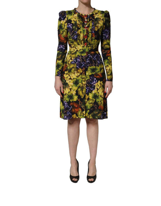 Dress by Dolce & Gabbana for women in stretch viscose black, multicolor, patterned & print features an eye catching silhouette with a sophisticated keyhole neckline, elegant long-sleeve, and a refined midi for a eye catching aesthetic.