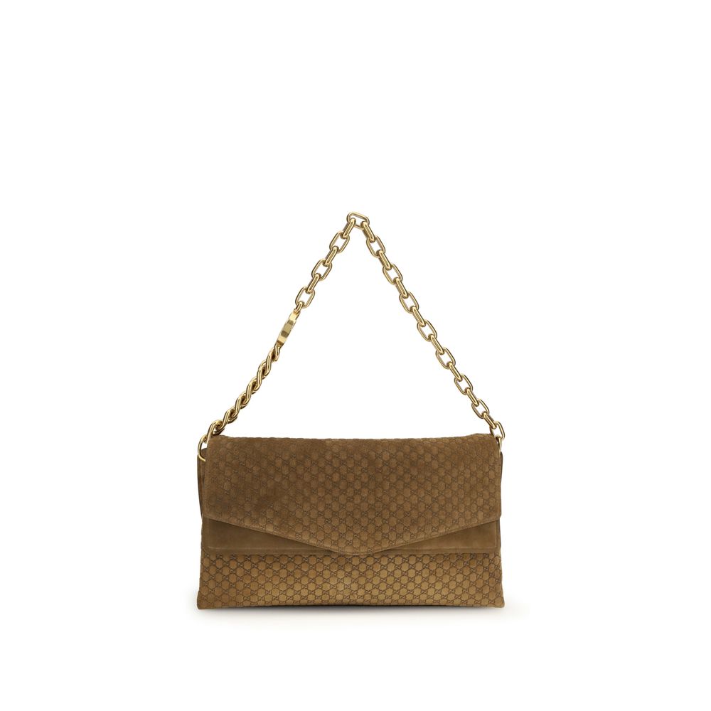 Large Shoulder Flap Handbag by Gucci for women in raffia & suede leather beige, camel & signature features an refined silhouette, showcasing a secure flap, magnetic & button, ample , and versatile shoulder-strap for a sophisticated refined aesthetic.