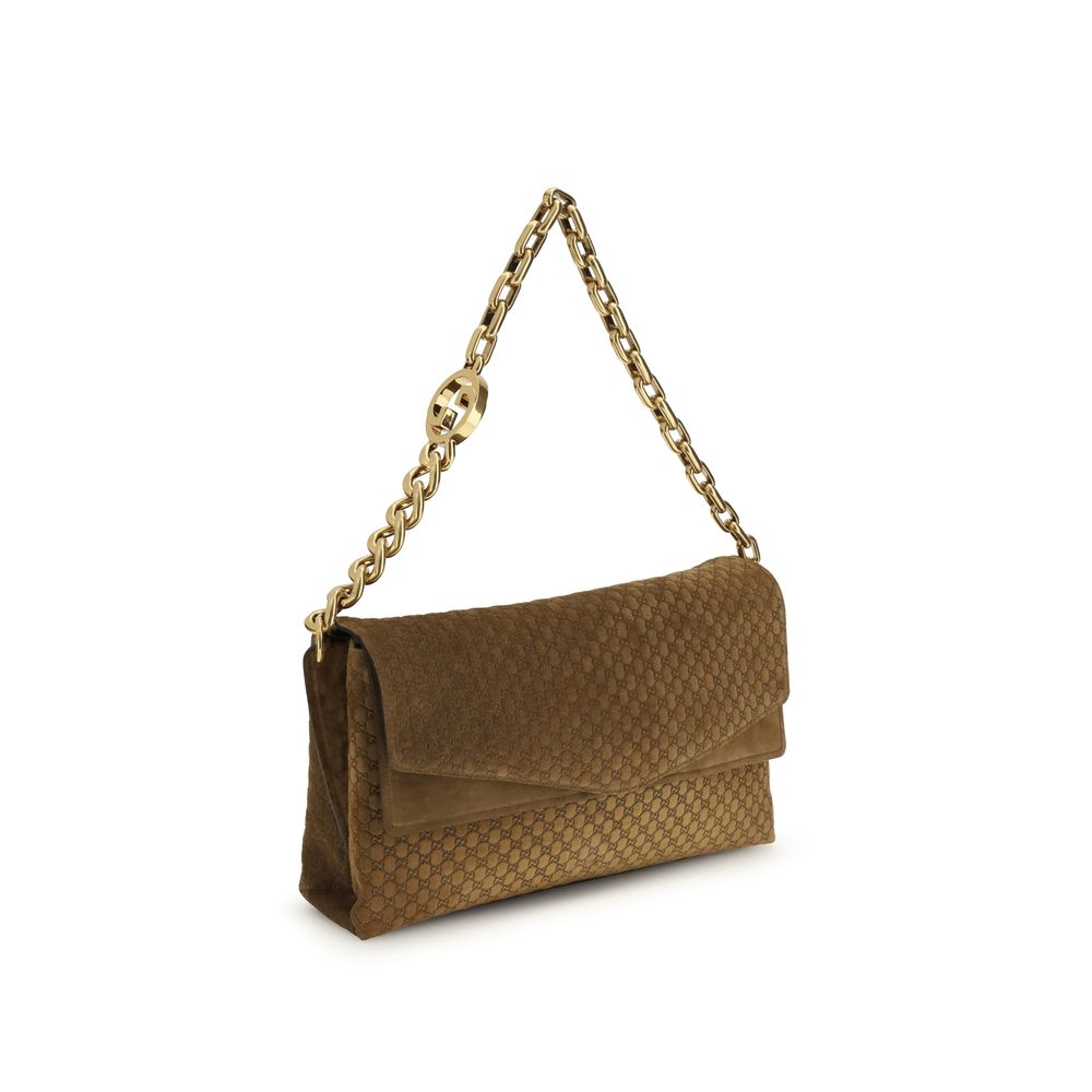 Large Shoulder Flap Handbag by Gucci for women in raffia & suede leather beige, camel & signature features a signature silhouette, showcasing a secure flap, magnetic & button and signature with versatile shoulder-strap for a sophisticated look.