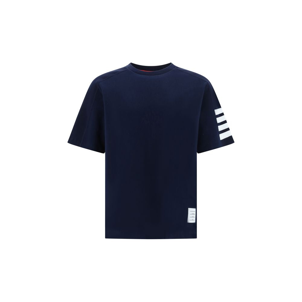 T-Shirt by Thom Browne for men in cotton blue, monogram & striped showcases a chic silhouette, artfully detailed with a chic crew neckline and for a chic finish.