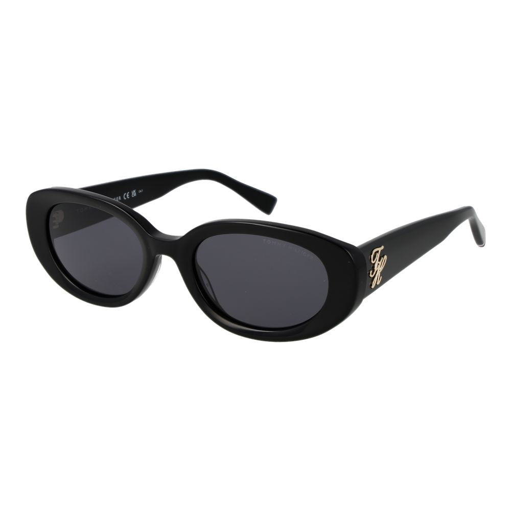 Sunglasses by Tommy Hilfiger for women in acetate black showcases a ethereal silhouette, featuring black coloured frame full-rim oval frame design with non-polarized category-3-dark-tint lens for a ethereal finish.