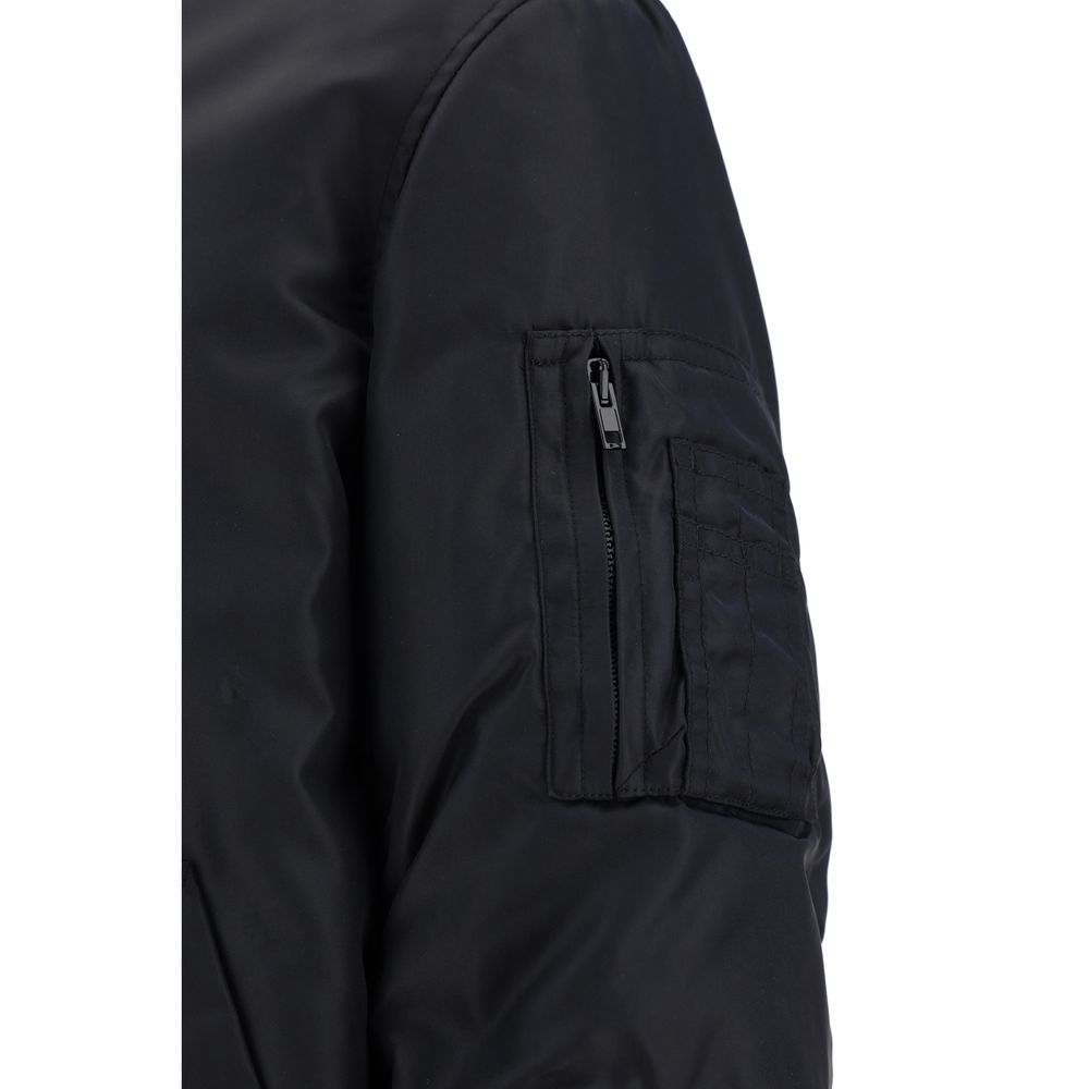 Bomber Jacket by Moschino for men in polyamide black & print presents a effortlessly chic silhouette, showcasing a sophisticated and premium pockets & insulated for a truly effortlessly chic finish.