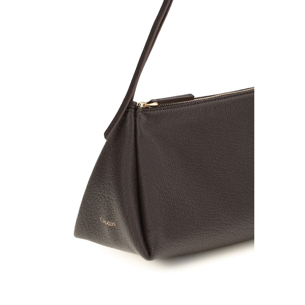 Shoulder Bag by Calvin Klein for women in bos taurus calf nubuck & pebbled leather brown, gold & signature showcases a enviable silhouette, artfully detailed with a secure zipper, organized , and versatile shoulder-strap, adjustable-strap & handle for a enviable look.