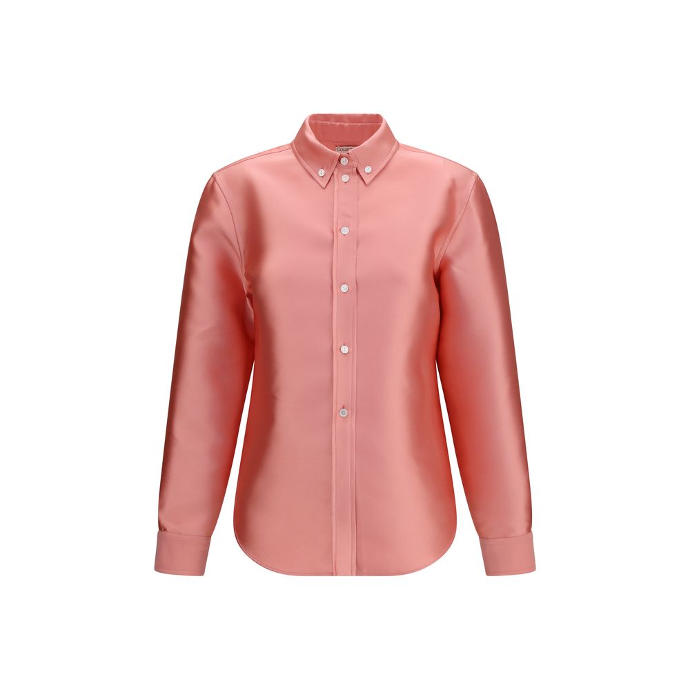 Dress Shirt by Calvin Klein for women in polyester & silk multicolor showcases a sharp silhouette, elegantly detailed with a sharp and sharp .
