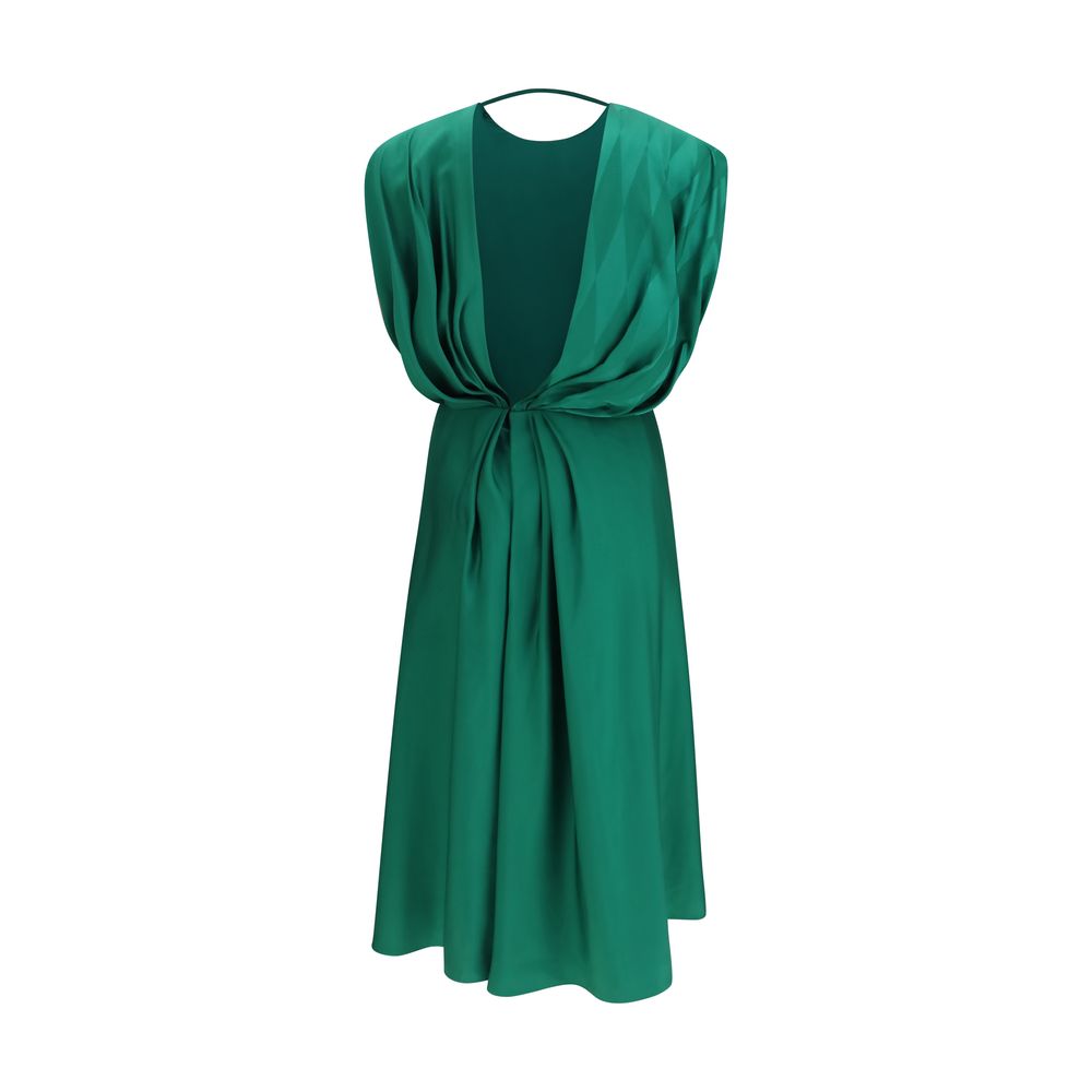 Dress by Versace for women in silk bicolour & patterned features an sultry silhouette defined by a round neckline and , falling to an sultry midi for a sultry look.