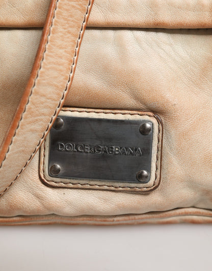 2-in-1 Shoulder & Crossbody Clutch Convertible Handbag by Dolce & Gabbana for men in leather & velvet beige features a polished silhouette with a secure , ample , and polished crossbody-strap & shoulder-strap for a sophisticated look.