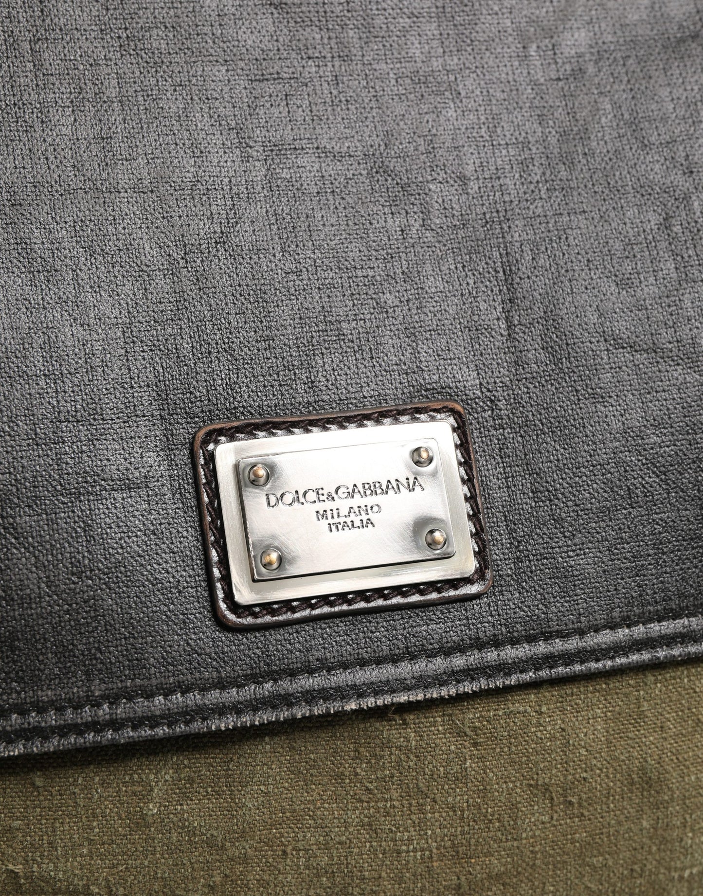 Shoulder Messenger Clutch Convertible Handbag by Dolce & Gabbana for men in leather & metal dark-green & military-green features a polished silhouette with a secure buckle, ample , and polished shoulder-strap for a sophisticated look.