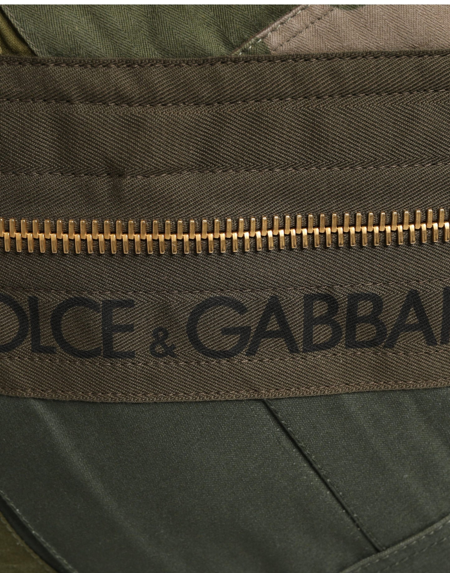 Mini Rucksack Backpack by Dolce & Gabbana for men in calf leather viscose & cotton military-green & patchwork showcases an architectural Calf Leather Viscose Cotton Mini Rucksack Backpack design, featuring a secure zipper, ample , and architectural shoulder-strap & backpack-strap for a sophisticated look.