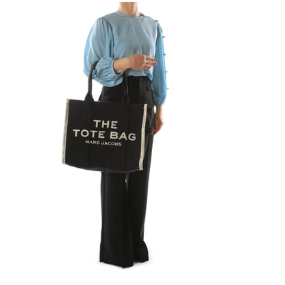 Large Shoulder Bag by Marc Jacobs for women in fabric black presents a statuesque silhouette, showcasing a secure zipper and statuesque internal-pockets with versatile shoulder-strap & handle for a sophisticated look.