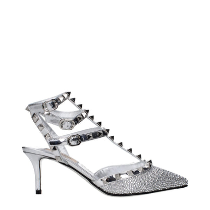 Stiletto Sandals by Valentino Garavani for women in patent leather gray & silver showcases a sculptural silhouette as Women's Patent Leather Stiletto Sandals, defined by a sculptural stiletto and sculptural for a sculptural look.