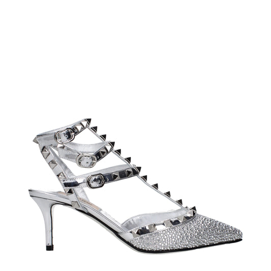 Stiletto Sandals by Valentino Garavani for women in patent leather gray & silver showcases a sculptural silhouette as Women's Patent Leather Stiletto Sandals, defined by a sculptural stiletto and sculptural for a sculptural look.