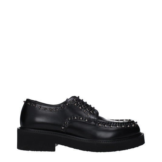 Mid-Heel Lace-Up Shoes by Valentino Garavani for men in leather & rubber black showcases a impeccable silhouette as Men's Leather & Rubber Mid-Heel Lace-Up Shoes, artfully designed with a impeccable 4-5-cm-heel mid-heel and refined round toe style for a impeccable finish.