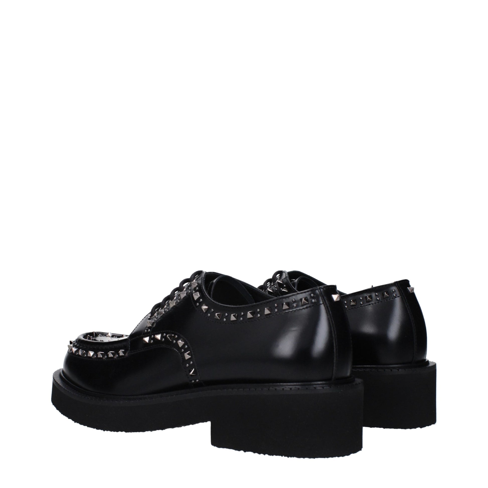 Mid-Heel Lace-Up Shoes by Valentino Garavani for men in leather & rubber black features an dynamic silhouette from the Men's Leather & Rubber Mid-Heel Lace-Up Shoes collection, defined by a dynamic round toe style and 4-5-cm-heel mid-heel for a dynamic look.