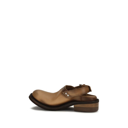 Mules Flat Shoes by Miu Miu for women in bos taurus calf leather brown showcases a resplendent Women's Bos Taurus Calf Leather Mules Flat Shoes aesthetic with a and round toe style.