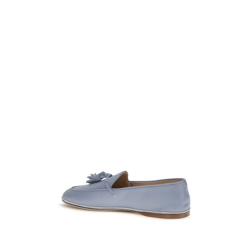 Flat Loafer Slip-On Shoes by Fratelli Rossetti for women in bos taurus calf leather blue showcases a timeless silhouette from the Women's Bos Taurus Calf Leather Flat Loafer Slip-On Shoes collection, featuring a timeless flat and for a timeless finish.