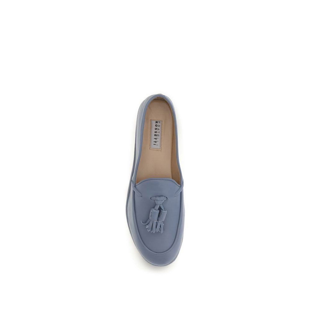Flat Loafer Slip-On Shoes by Fratelli Rossetti for women in bos taurus calf leather blue showcases a impeccable silhouette as Women's Bos Taurus Calf Leather Flat Loafer Slip-On Shoes, artfully designed with a impeccable flat and refined for a impeccable finish.