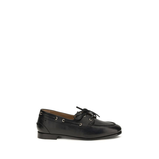 Flat Boat Loafer Slip-On Shoes by Bally for women in bos taurus calf & buffalo leather black & gold showcases a impeccable silhouette as Women's Bos Taurus Calf & Buffalo Leather Flat Boat Loafer Slip-On Shoes, artfully designed with a impeccable flat and refined for a impeccable finish.