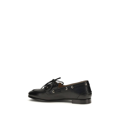 Flat Boat Loafer Slip-On Shoes by Bally for women in bos taurus calf & buffalo leather black & gold features an dynamic silhouette from the Women's Bos Taurus Calf & Buffalo Leather Flat Boat Loafer Slip-On Shoes collection, defined by a dynamic and flat for a dynamic look.