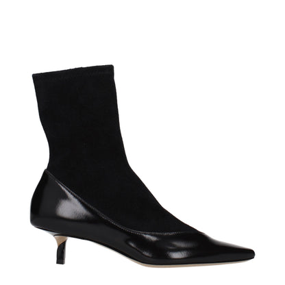 Ankle Boots by Jacquemus for women in suede leather black features an avant-garde Women's Suede Leather Ankle Boots silhouette, defined by a sophisticated and a avant-garde .