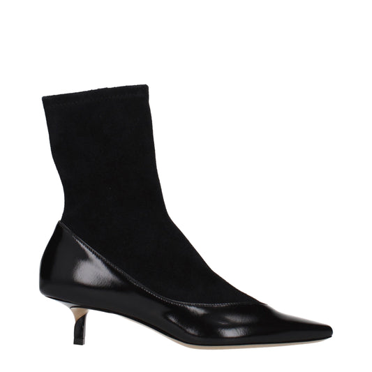 Ankle Boots by Jacquemus for women in suede leather black features an avant-garde Women's Suede Leather Ankle Boots silhouette, defined by a sophisticated and a avant-garde .