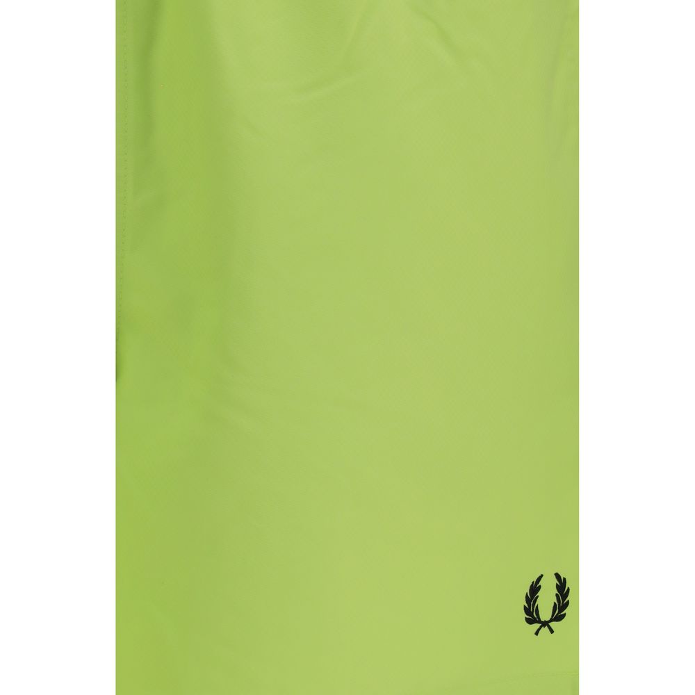 Swim Shorts by Fred Perry for men in polyester bicolour & signature features a magnificent design, channeling the luxury vibe of Laurel Perry Men's Polyester Swim Shorts.