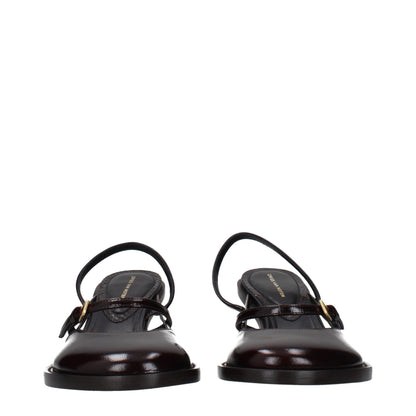 Flat Sandals by Dries Van Noten for women in leather brown presents a sculptural silhouette, showcasing the Women's Leather Flat Sandals design with a sculptural flat and for a premium look.