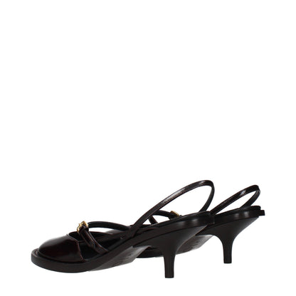 Flat Sandals by Dries Van Noten for women in leather brown presents a sculptural silhouette, showcasing the Women's Leather Flat Sandals design with a sculptural flat and for a premium look.