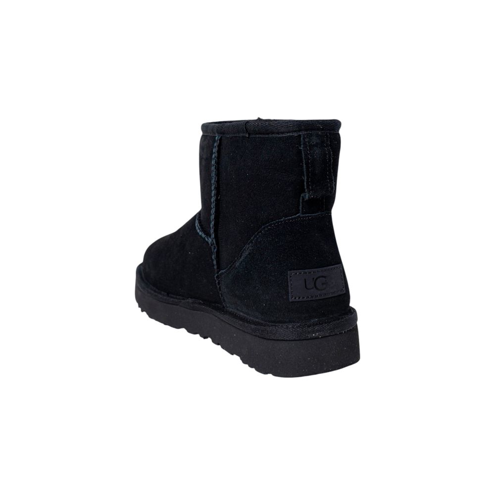 Ankle Winter Boots by UGG for women in suede leather black features an aerodynamic silhouette from the Women's Lightweight Suede Leather Ankle Winter Boots collection, showcasing a aerodynamic and refined for an aerodynamic look.