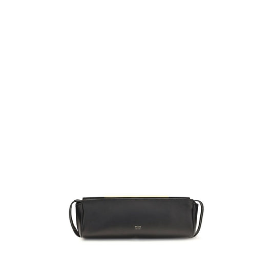Evening Clutch Handbag by Khaite for women in bos taurus calf leather black & gold features a statuesque silhouette, showcasing a secure zipper and organized with versatile for statuesque evening wear.