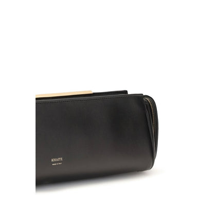 Evening Clutch Handbag by Khaite for women in bos taurus calf leather black & gold features a sculptural silhouette with a secure zipper, organized , and versatile for a sculptural finish.